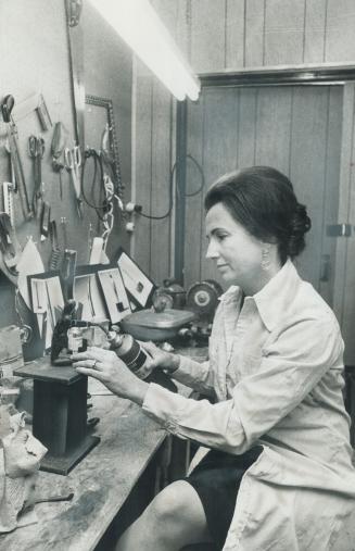 Aileen Cowan, Toronto sculptor who works with wax, is as creative in her studio above, as in her north Toronto Kitchen