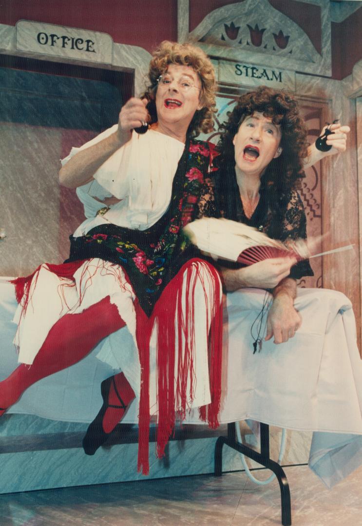 Revelling in a good role. Tom Kneebone (left) and Gary Krawford are dolled up for trip to a women's bath house in Variety Dinner Theatre's production (...)