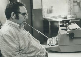 Artist at work: Benedetto painting with his teeth (right) and typing -- the two bright spots in a life torn by the pain and anger of MS