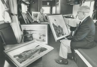 Artist art Ross and his wife, Anne, look over his paintings in the trailer which is their home for six months of the year. The couple spent the summer(...)