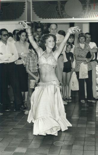 Egypt lure. Belly dancer Lynn Glover does her bit at Sherway Gardens to help promote fourth-coming King Tutankhamun exhibit at the Art Gallery of Ontario