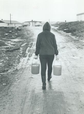 Arnold's Cove NFLD, she hauls water 1/2 ml 6 times a day