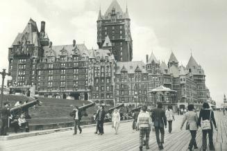 Chateau Frontenac looms above Dufferin Terrace like a leftover from medieval times and seems to add just the right flavor to a walking tour of Quebec (...)