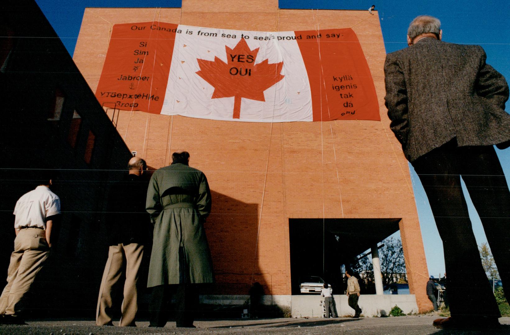 Don't Take a Chance: Huge flag hung by students on a downtown Brampton building exhorts residents not to risk voting No in Monday's constitutional referendum