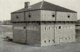 Blockhouse inside the ramp arts of Fort Wellington near Prescott Ont it is surrounded by sharp pointier logs driven into the grounds and standing about 12 feet above the surface