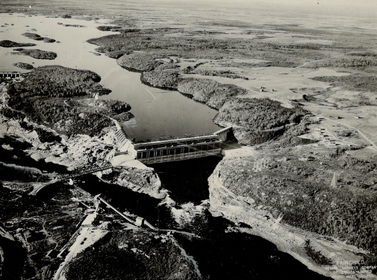 Power site in Quebec Isle Maligne power dam on Saguenay River, Quebec, owned by Duke Price power company, develops 495,000 horsepower