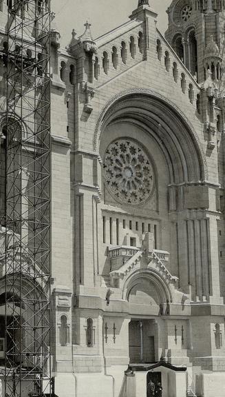 The new shrine at St. Anne de Beaupre, Que., replaces the former structures destroyed by fire. The towers are as yet unfinished but the church is in use