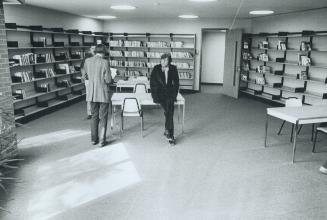 5 Library Dr Meen sitting on table