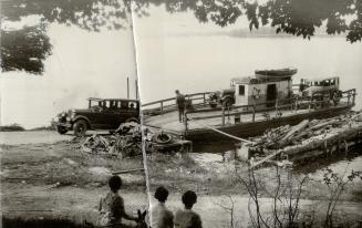 The quanit ferry ferry that carries passengers and motor cars from Glenora to adolphustown on the Bay of Qunite