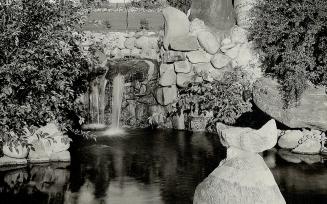 The stone canoe-a unique rock formation dug up at the Ontario Reformatory, Guelph, when they were beautifying the grounds of the model institution. It(...)