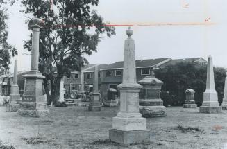 The past and the future are side by side in the community as new townhouses go up around the 150-year-old cemetery on Derry Rd. in Meadowvale West. Gr(...)