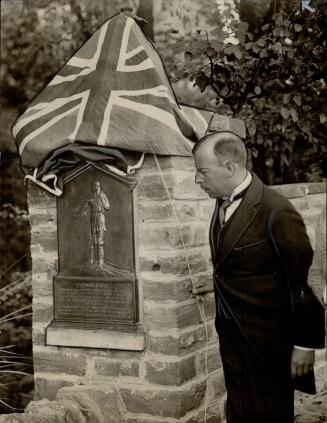 Louis Cote of Ottawa unveiling the tablet in memory of the great explorer, Etienne Brule, who journeyed down the Humber river to discover Lake Ontario