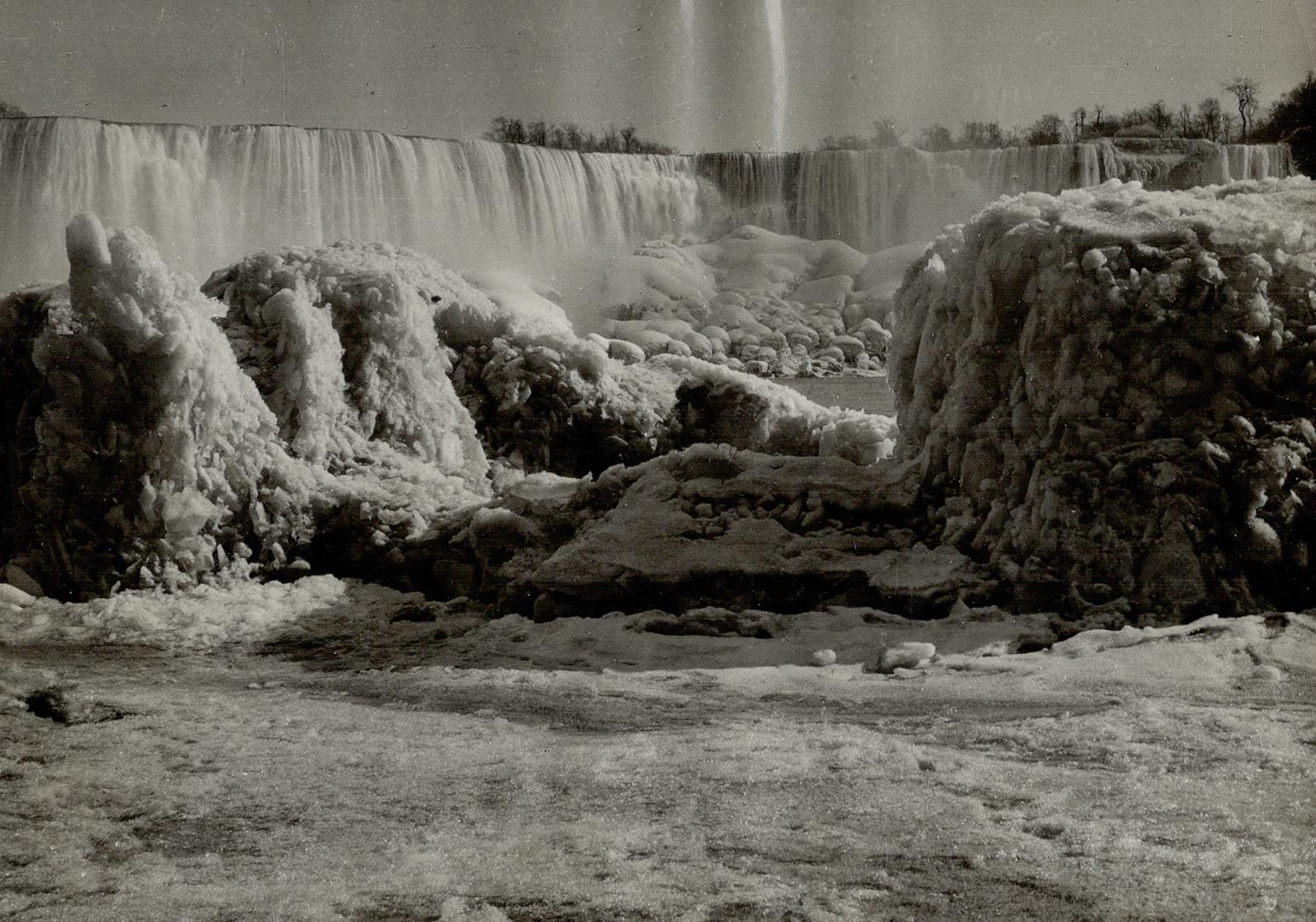 Jack Frost in action! A fine winter scene at Niagara Falls, with the frozen spray making quaint castles and great weird formations in the foreground, (...)