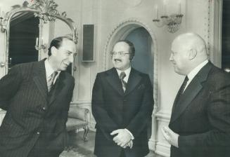 Three members of the reshuffled cabinet gather to be sworn in