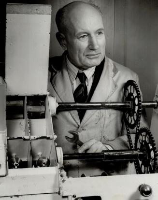 He gave us a new bread. This is Dr. L. H. Newman; Dominian cerealist of Ottawa; who; after years of research produced the type of bread that is said to be best suited to Canada's wartime needs. It's known as the Canada Approved Vitamin 'B' White Bread; and contains four times as much vitamin B as standard white bread.