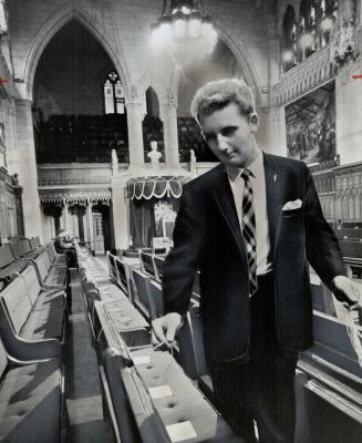 Place cards are distributed in the senate for the opening of Parliament