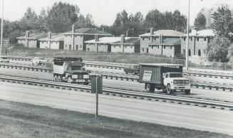 18 Semi-detached houses being built on the north side of Highway 401 near CFTO television station are on a site declared by a provincial environment m(...)