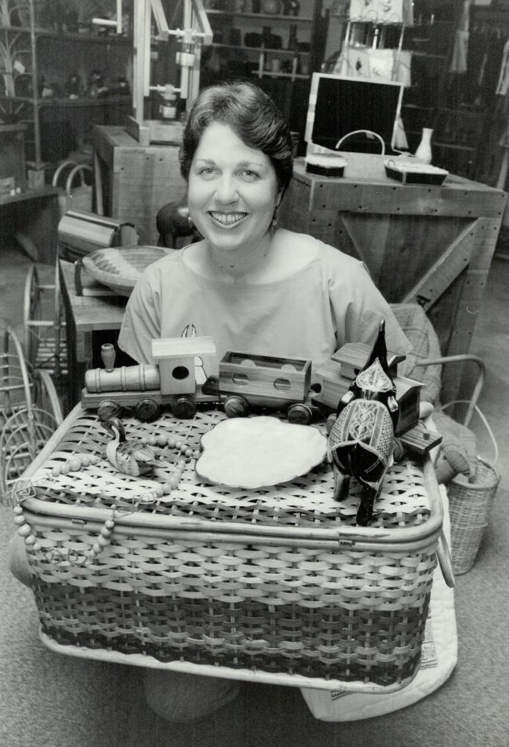 World of goods: Deborah Roberts of the Christian Blind Mission store in Stouffville displays some of the crafts made by disabled Third World artisans