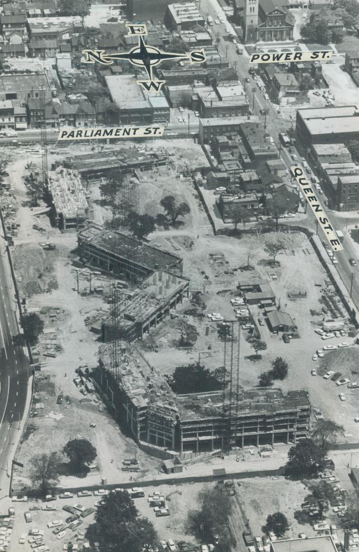 Aerial view of high-rise construction site looking toward Parliament Street. Street names are p…