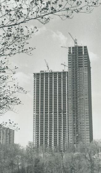 No balconies break the smooth outline of the 43-storey buildings of Leaside Towers on Overlea Blvd