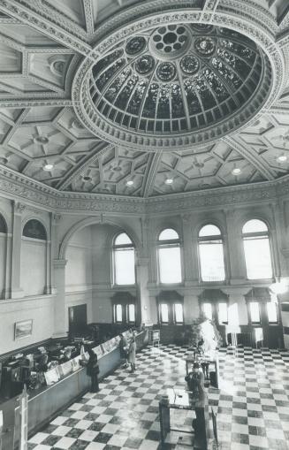 A stained glass dome dominates the Bank of Montreal branch at Yonge and Front Sts