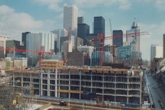 In foreground, the 10-storey CBC Broadcast Centre takes shape at Front and John Sts