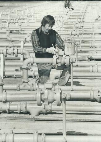 Waterproofing a fountain. This massive layout of pipes isn't part of some oil refinery but the fountain system in front of Ontario's Science Centre on(...)