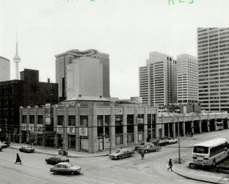 Bus terminal (left) is 'a place to make new arrivals feel like going home