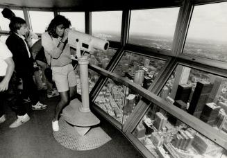 A view like no other of the Toronto skyline is what the CN Tower promises - and that's what it delivers