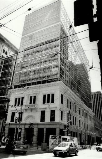 New look: The Millichamps Building, built in 1875, right, now boast a nine-storey mirrored tower and has been linked by a clear glass atrium to the Lennox Building, below