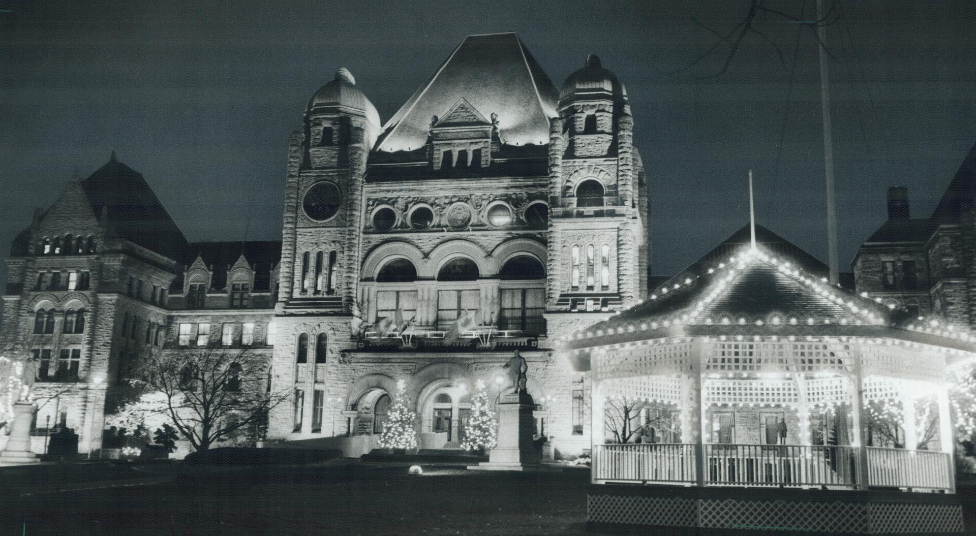 The lights are on: The spirit of Christmas in the city has even made stately old Queen's Park take on the sparkle of lights highlighting its architecture and glowing around the bandstand