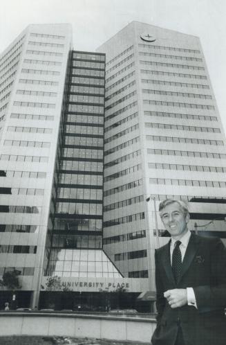 Do they or don't they? Officials say Toronto's University Place -- the new headquarters of Citibank Canada, officially opened by president Wm. Davis y(...)