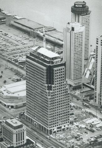 Skyline addition takes shape, The first tower of Campeau Corp