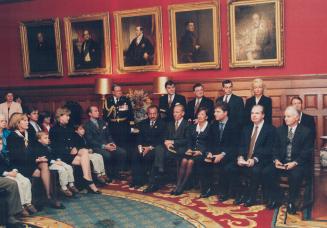 Taking Charge: Members of the Mike Harris' new cabinet were sworn in at Queen's Park yesterday