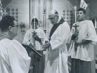 Stanley Gilbey, Who became a deacon at 66, conducting a service at St