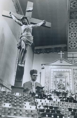 Greek Catholic, Monsignor Basil Filevich in his vestments at the altar of St