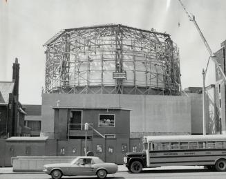 April 19, Shedding the plastic coating, dome of new multi-million dollar planetarium can be seen beneath timber framework