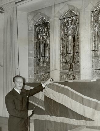 Grandson of the donor, Craig Matthews Somerville here unveils the west windows of the chapel, representing the Saviour enthroned