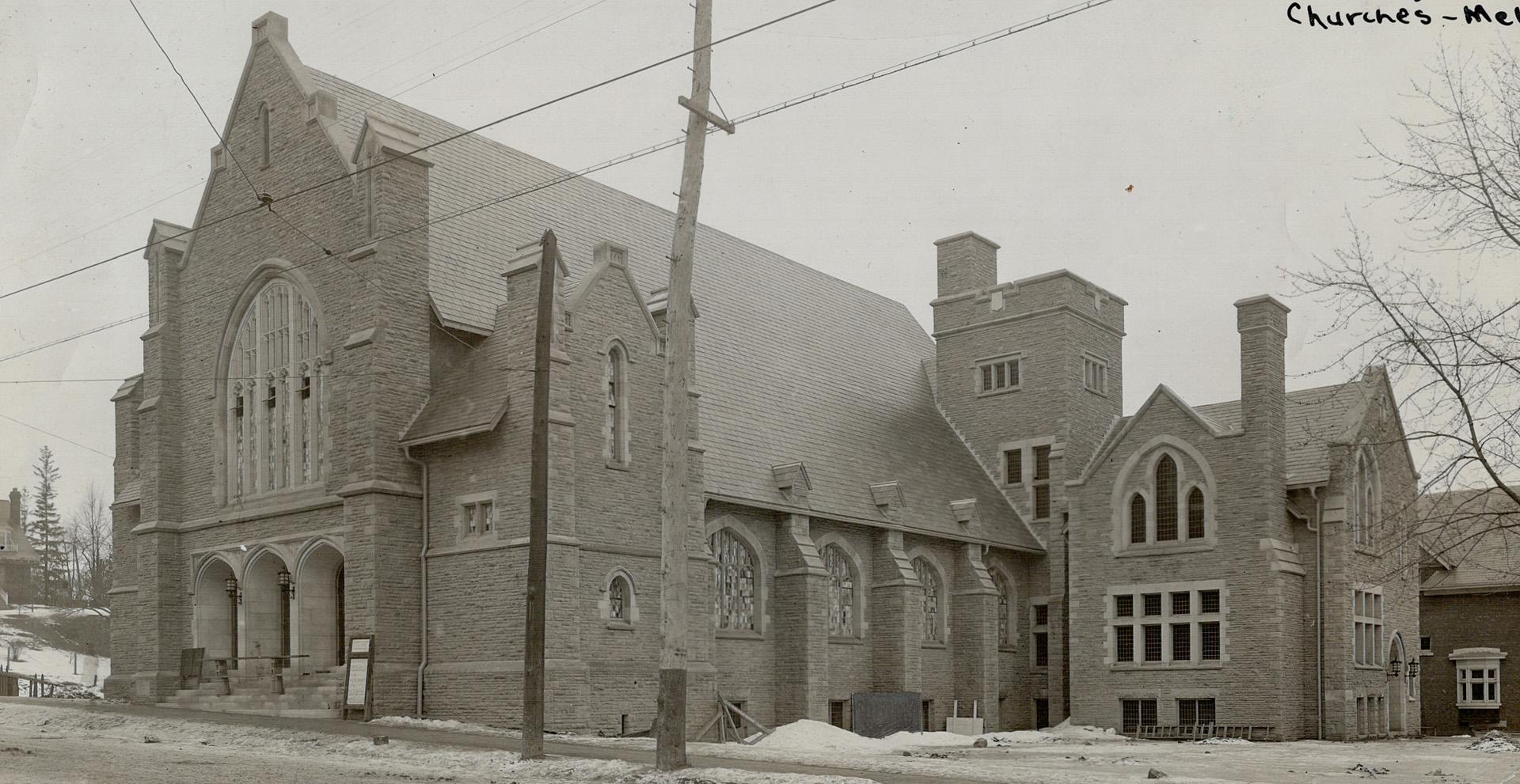 Image shows a partial front view and the side view of the church building.