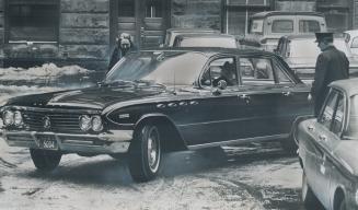 Limousines like this one cost Toronto Taxpayers $200,000 a year, Controller Margaret Campbell gets out of her chauffeur-driven car at city hall