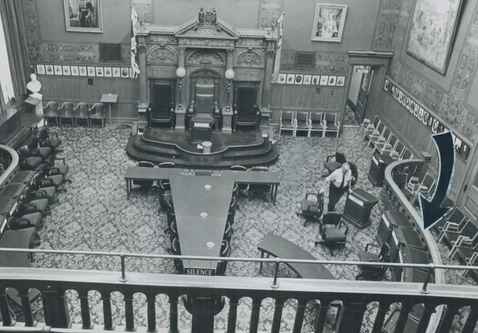 'Holy Rail' gets the gate, Workmen cart away a 17-foot section of the holy rail from council chambers in City Hall and take it to the attic