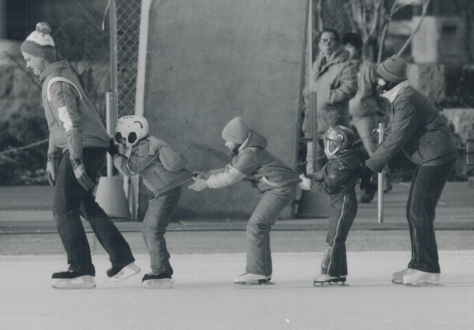 Following in dad's slippery footsteps, The starting lineup for a day of skating at Nathan Phillips Square yesterday includes the Alexander family from Pickering