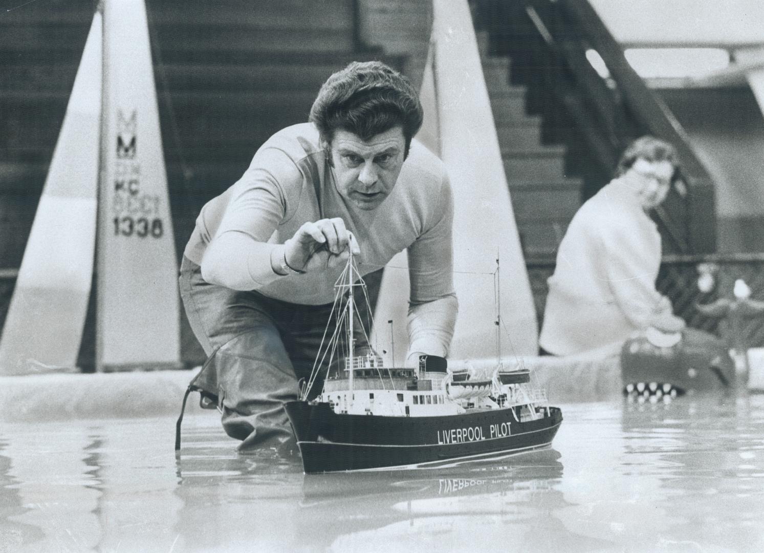 The little one: Roy Davidson's 44-inch Liverpool Pilot, results of four years' toil and $1,500, is launched as a model entrant at the Boat Show