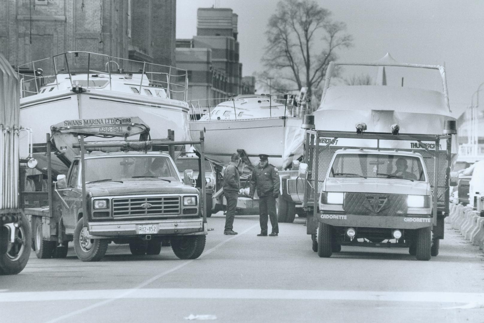 Boat Jam at the CNE, Truck drivers Jockey for position outside the Collseum at Exhibition Place yesterday, preparing to move their nautical cargo into(...)