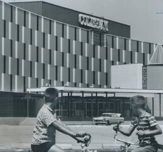 Boris Szmaka, Steve Yarkun admire new facade for CNE coliseum, New look in buildings, new rides in midway and headliner Bob Goulet add interest to this year's fair