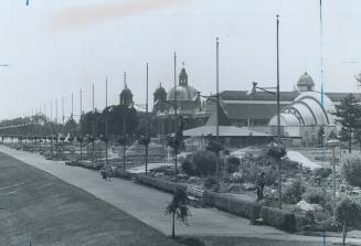 The flower gardens behind the CNE enlarged and improved this year, Everywhere on the grounds workmen are busy undings for the 85th annual Exhibition [Incomplete]