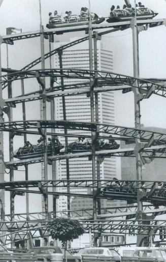 They call it the jumbo jet and when you're at the top it seems as high as city's tallest office building, First Canada Place, towering in background. (...)