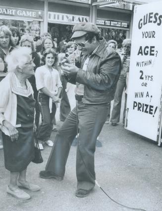 It's a nine-year miss, for age-guesser Barry Vigon as 105-year-old Caroline Pierce smiles mischievously at the CNE Midway yesterday. She's been his ol(...)