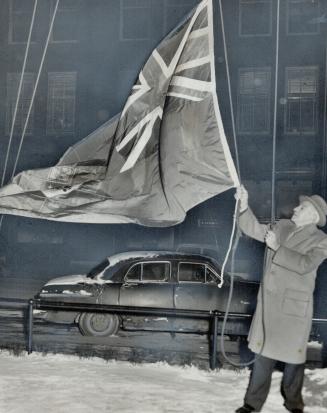 For first time the Red Ensign in raised on the city hall flag pole by civic employee Malcolm Bell, replacing traditional Union Jack. Edgar Norris, cit(...)