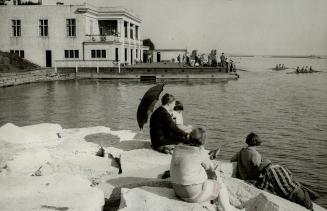 A pleasant vie of the Argonaut rowing club's commodious quarters at the foot of Dowling Avenue, Toronto